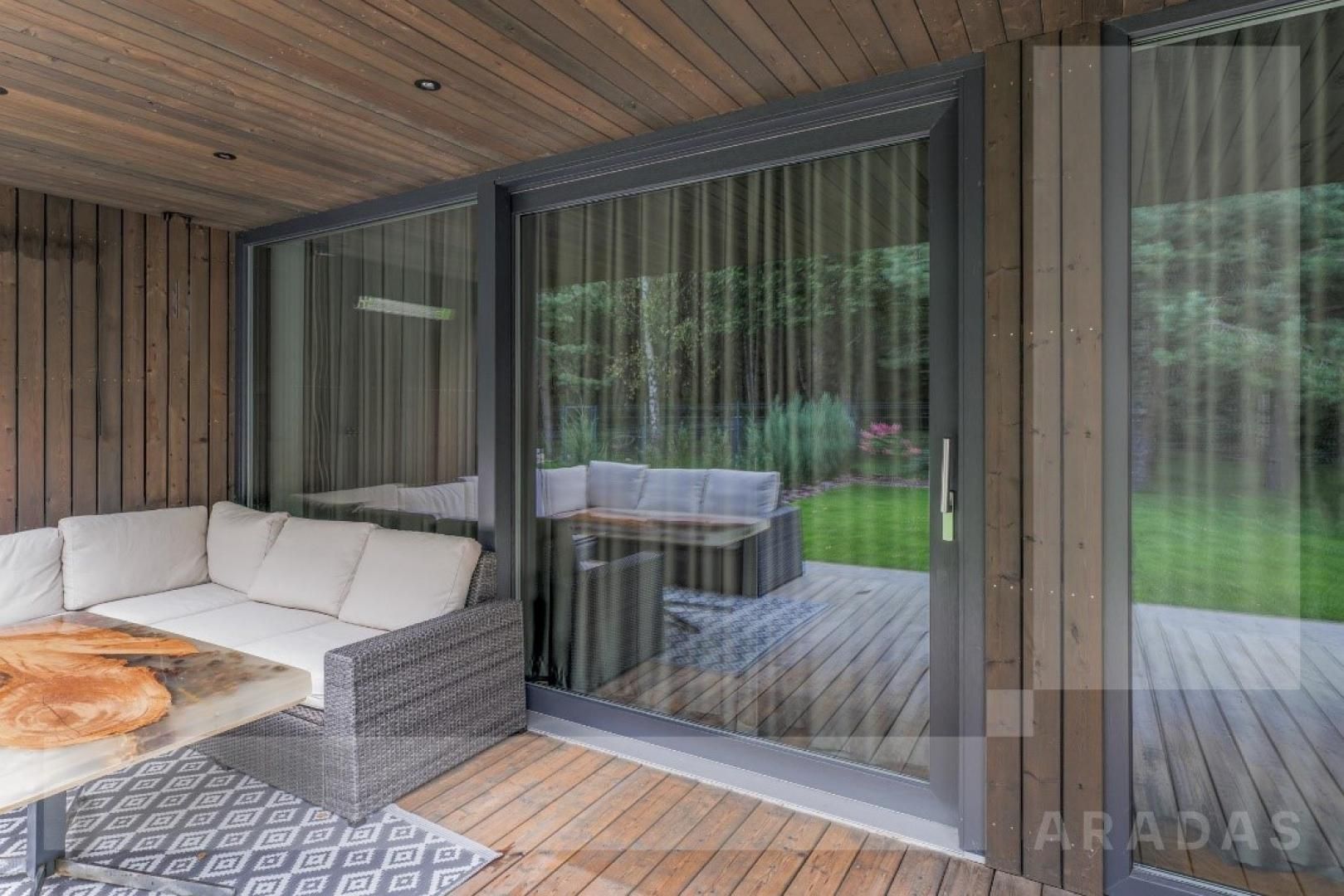 A picture containing building, indoor, wooden, porchDescription automatically generated